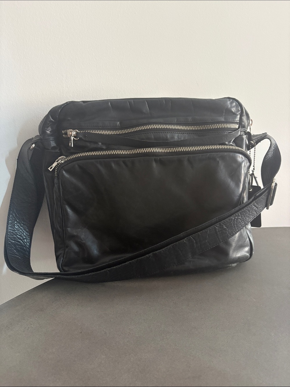 RUDSAK Black Leather Messenger Bag with Silver Hardware